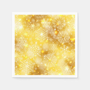 Snöflingor på golden pappersservett