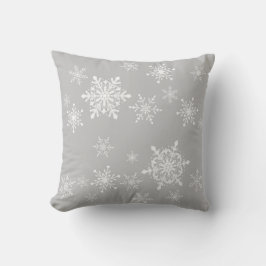 snöflingor på grått kudde