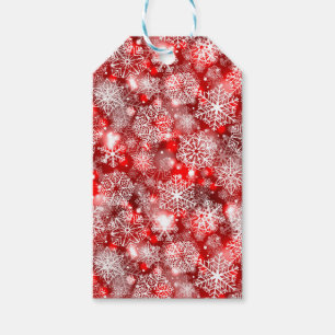 Snöflingor på rött presentetikett