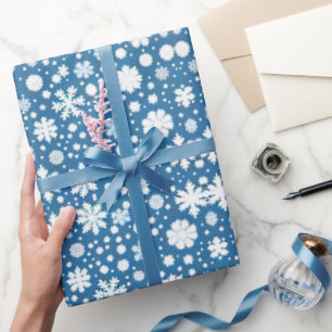 Snöflingor som upprepar blått mönster presentpapper
