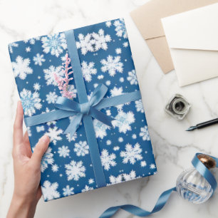 Snöflingor som upprepar blått mönster presentpapper