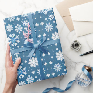 Snöflingor som upprepar blått mönster presentpapper