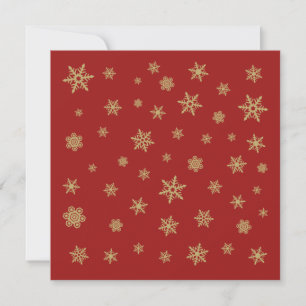 Snöflingordesignguld på rött julkort