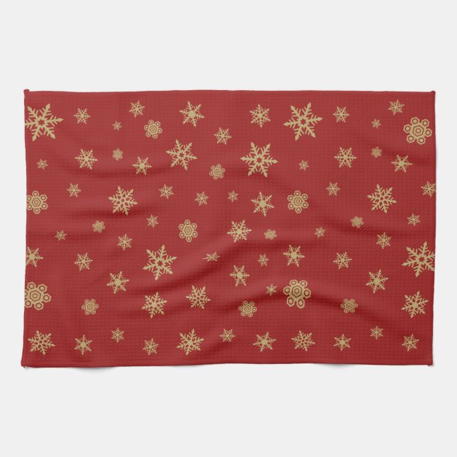 Snöflingormönsterguld på rött kökshandduk (Horisontell)