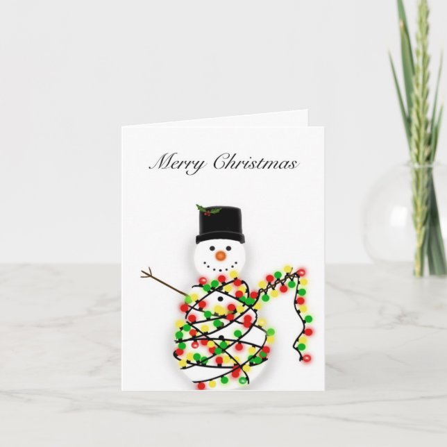 Snögubbe är snärjt i ljus-Julafton-kort Helgkort (Framsida)
