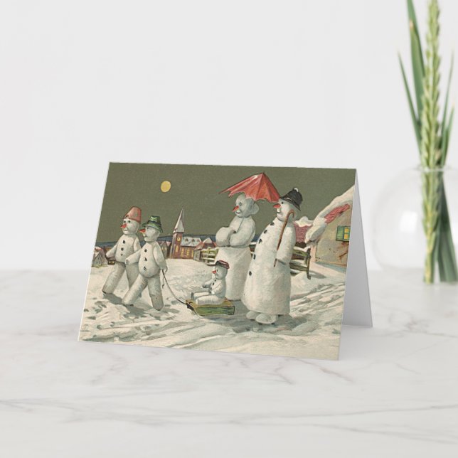 Snögubbe-familjens vinterspel i Snö kyrkan Helgkort (Framsida)