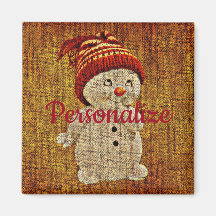 Snögubbe på den skumma, rustiska vintern