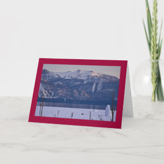 Snögubbe på kanten av Lake Tahoe Helgkort