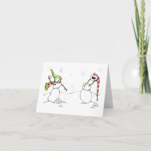 Snögubbear kastar snöboll slagsmål helgkort