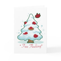 Snöig julgran med fåglar