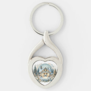 Snöig stugscen med glöd twisted heart silverfärgad nyckelring
