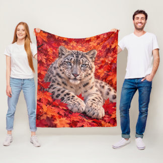 Snöleopard bland höstlönnblad – Wildlife Art Fleecefilt