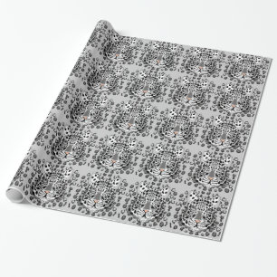 SnöLeopard som slår in papper Presentpapper
