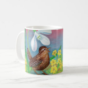 Snovdroppen och den bruna fågeln vid vår kaffemugg