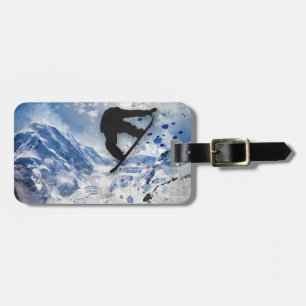 Snowboarder i flyg bagagebricka