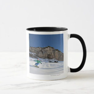 Snowboarderen frigör ridning mugg