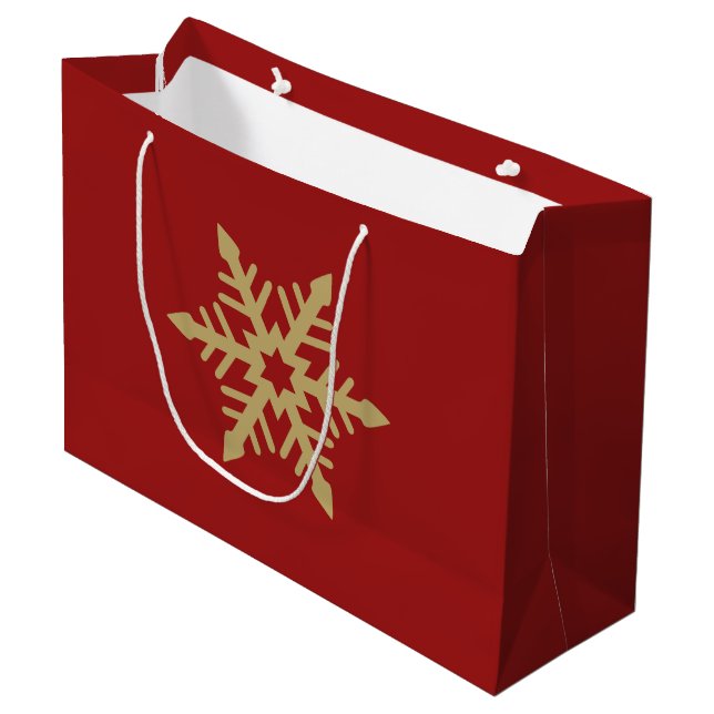 Snowflakedesignguld på rött (Framsidan Vinklad)