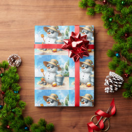 Snowman at the beach during Christmas holiday  Presentpapper