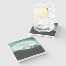 Snowy bergsmystisk blå neonljusmonogram stenunderlägg