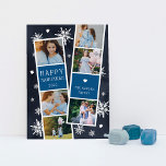 Snowy Photobooth Hanukkah Photo Collage Julkort<br><div class="desc">Cute Hanukkah-fotokortet innehåller två fotorremsor,  var och en med tre foton och en blå textpanel,  för totalt sex foton. Anpassa med året och din familj namn eller namn på vita,  festliga bokstäver,  på en marin blå bakgrund prickad med handvit snöflingor och vita stjärnor av David.</div>