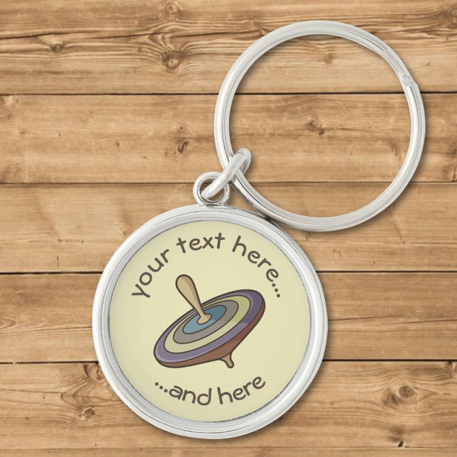 Snurra Toppen Rund Silverfärgad Nyckelring (Skapare uppladdad)