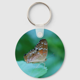 Snygg Danaus Plexippus Butterfly på Löv. Nyckelring