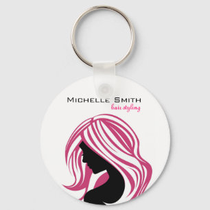 Snygg flicka med rosa hårhårklingande varumärke nyckelring