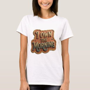 Snygg guld 'JAG ÄGER MORGONEN' grafisk t-shirt