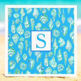 Snygga sjöskal på blå monogram-strand pappersservett