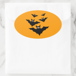 Snygga söta svarta fladdermöss Halloween på Orange Ovalt Klistermärke