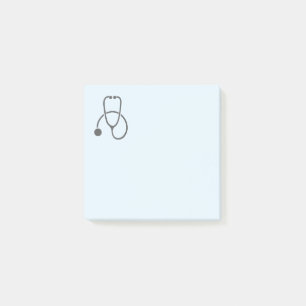 Snyggt Grått Stetoscope på Pastellblått Post-it Block