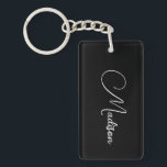 Snyggt Modern Script Namn<br><div class="desc">En enkel, snyggt, skript-namn-nyckelkedja med vit typografi på svart. Minimalistiskt stil.</div>