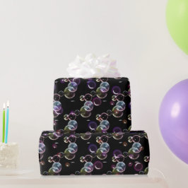 Soap-bubblor på svart presentpapper