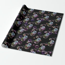 Soap-bubblor på svart presentpapper