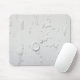 Soap-bubblor på vitt musmatta