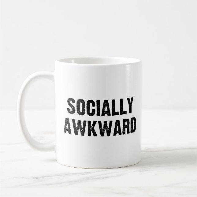 Socialt konstigt kaffemugg (Vänster)