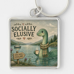 Socialt undvikande Nessie mysig kryptid Loch Ness Fyrkantig Silverfärgad Nyckelring