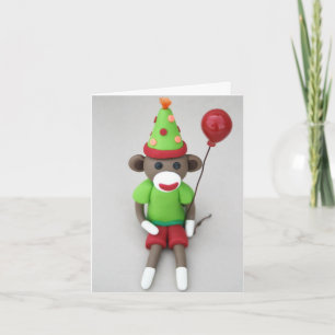 Sock monkey Grattis på födelsedagen med röd ballon Kort