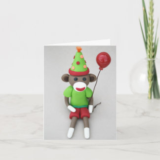 Sock monkey Grattis på födelsedagen med röd ballon Kort