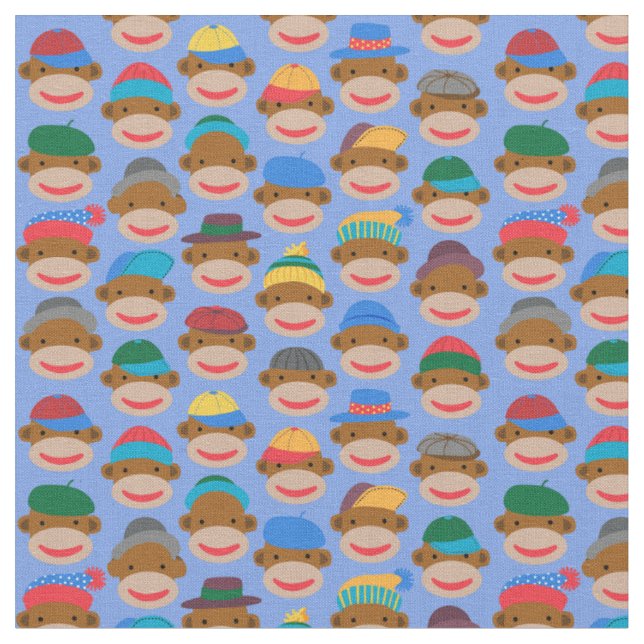 Sock Monkey Heads with caps on Blue Fabric Tyg (Närbild)