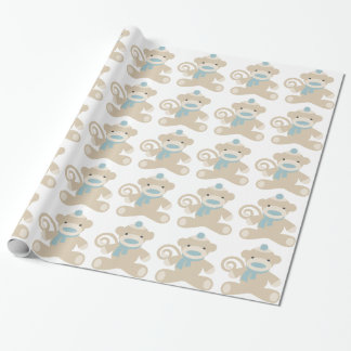Sock monkey i blått presentpapper