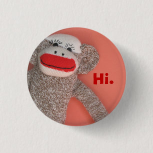 Sock monkey knäppas knapp