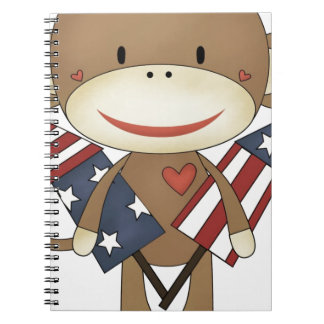 Sock monkey med raket anteckningsbok med spiral