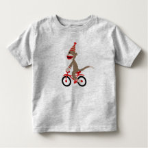 Sock monkey på cykeln