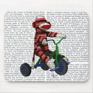 Sock monkey på trecykel musmatta