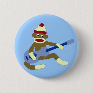 Sock monkey som leker blåttgitarren knapp