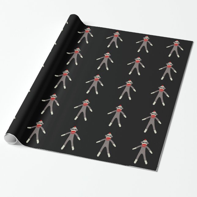 Sock monkey som slår in papper presentpapper (Utrullad)