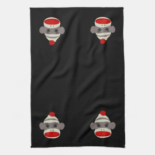 Sock monkeyansikte kökshandduk