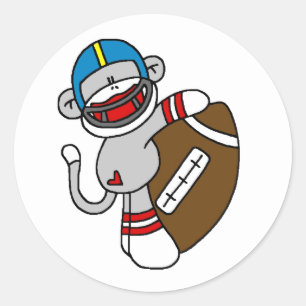 Sock monkeyfotboll runt klistermärke