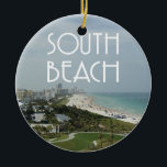 Södra strandMiami Florida foto Julgransprydnad Keramik<br><div class="desc">Den södra stranden,  Miami,  Florida landskap platsen av stranden och delen av stadshorisonten med ord "södra strand" upptill i en art décostilstilsort.</div>